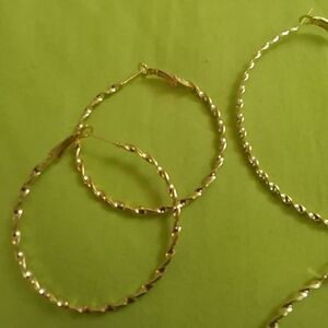One Pair of twist gold hoops